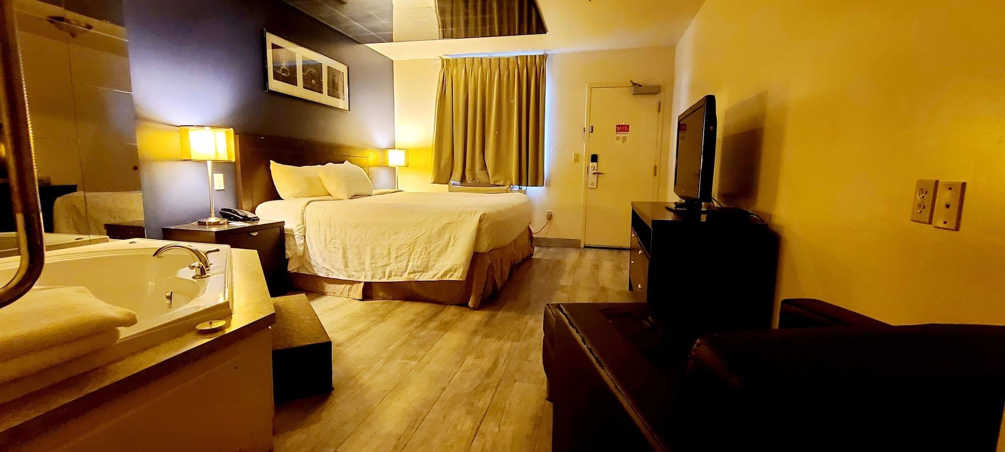 Empire Inn & Suites Penhold Bagian luar foto