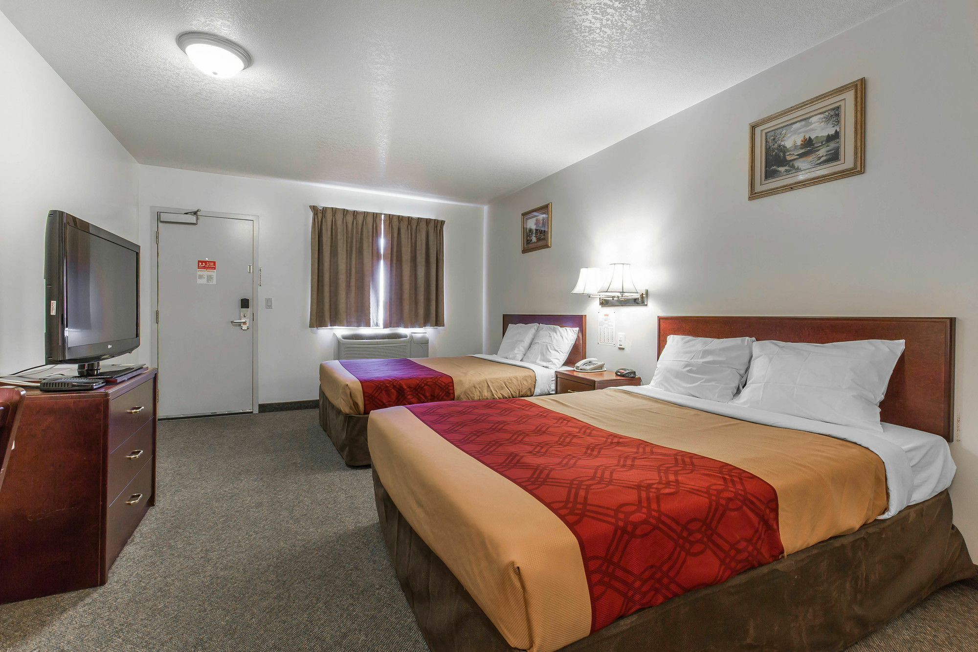 Empire Inn & Suites Penhold Bagian luar foto